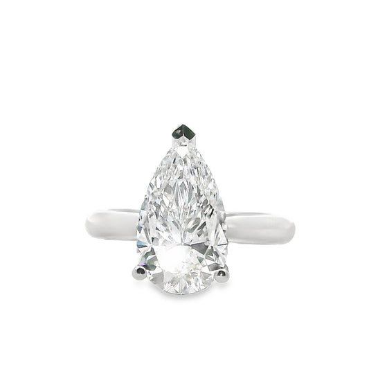 Stunning Hand Made Platinum Pear-Shaped Diamond with hidden diamond set halo Ring